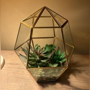 Terrarium with glass and faux succulents